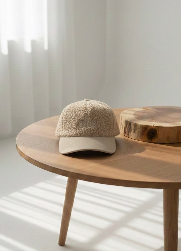 “Alo” off-white textured cap.