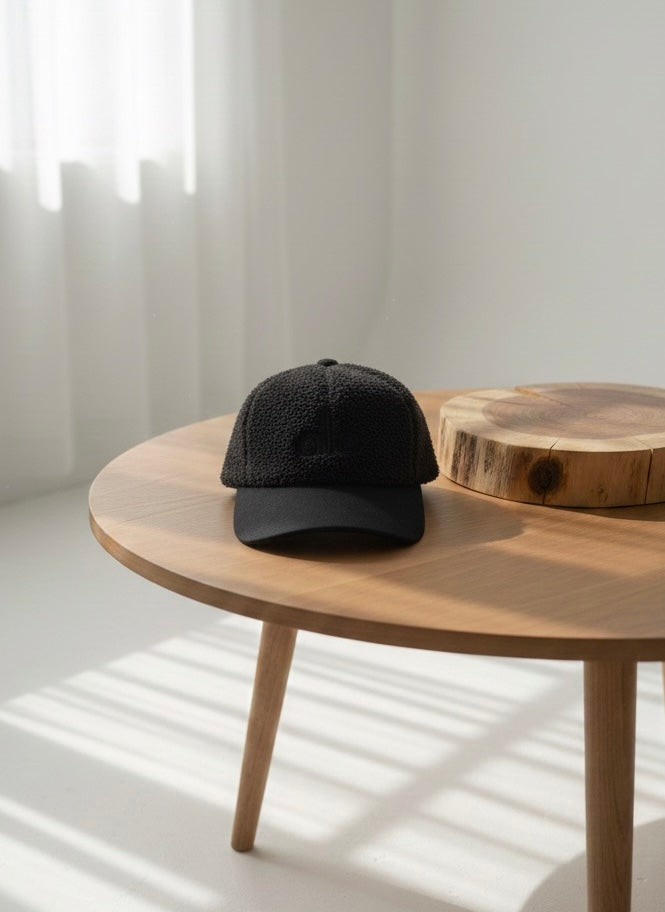 “Alo” black textured cap