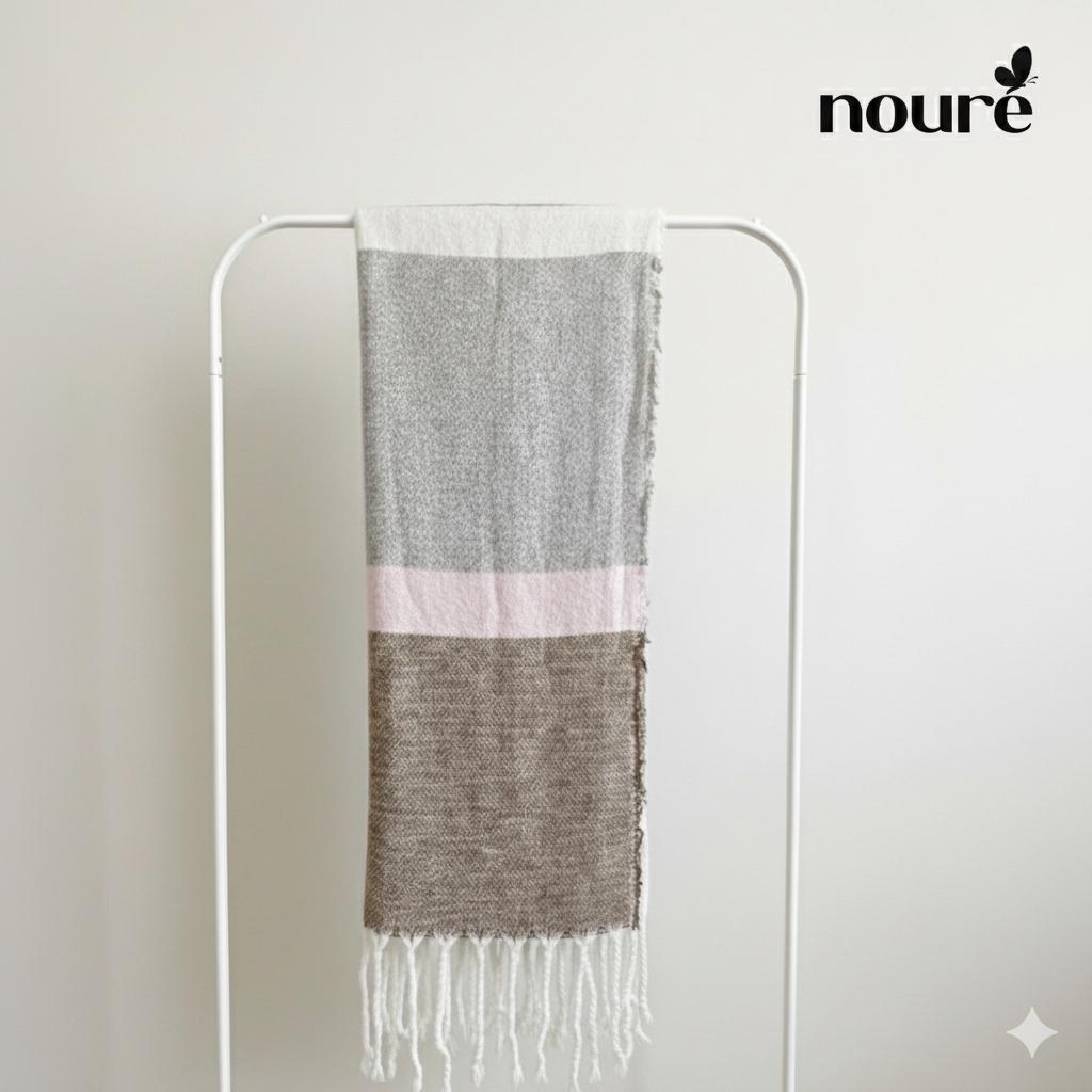 Striped scarf with blocks of white, light gray, soft pink, and brown